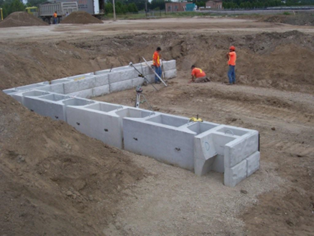 The instillation of a precast retaining wall system at a waste transfer facility in Strathroy-Caradoc, ON.
