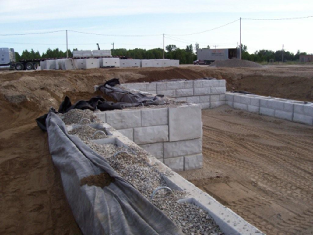 The instillation of a precast retaining wall system at a waste transfer facility in Strathroy-Caradoc, ON.