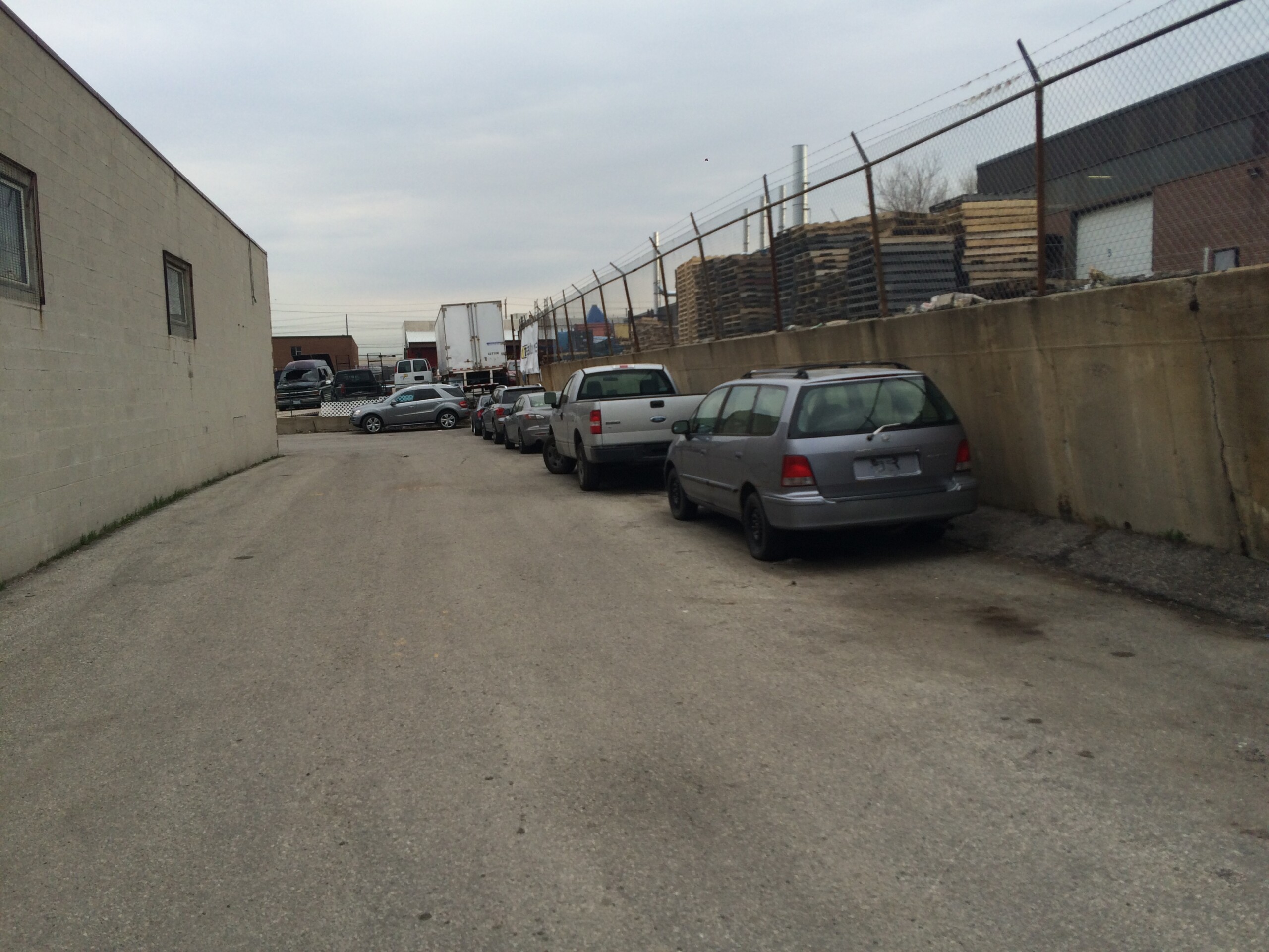 The former cast-in-place concrete retaining wall at an industrial facility, Smokey Manufacturing in Toronto, Ontario.