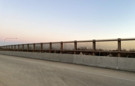 Acrylite Soundstop MASH TL-4 system mounted on a bridge along Illinois Route 390 in Itasca, Illinois.