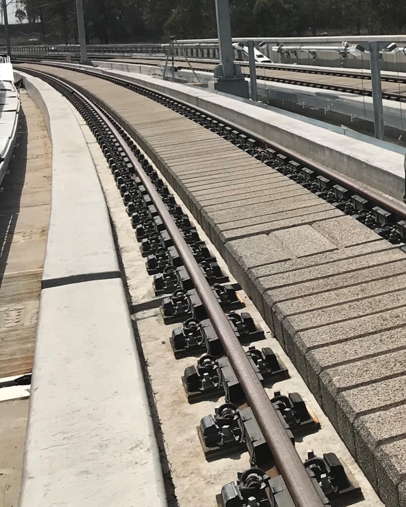 The Nexcem Acoustic Railway Silencers placed between the railway lines.